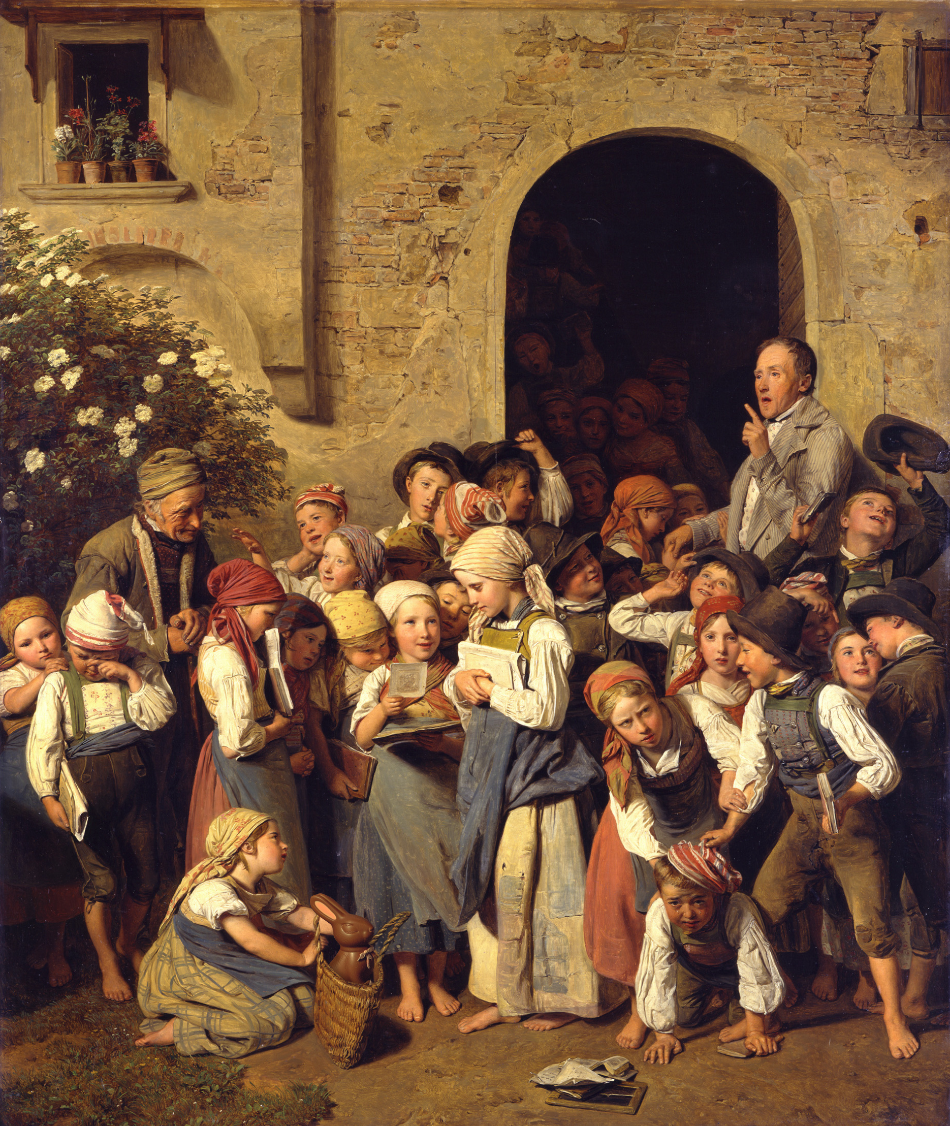 Children leaving school in a crowded group with a teacher at the gate.